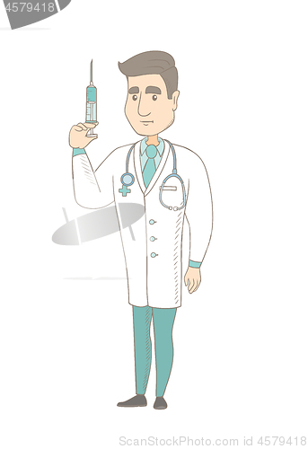 Image of Young caucasian doctor holding syringe.