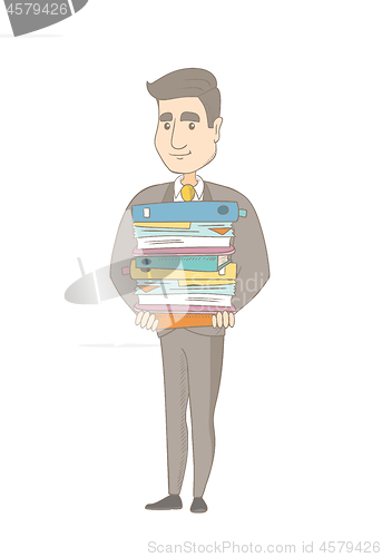 Image of Caucasian office worker holding pile of folders.