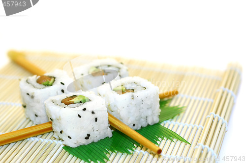 Image of Sushi Rolls structured over white