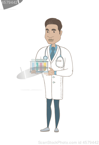 Image of Laboratory assistant analyzing blood in test tube.