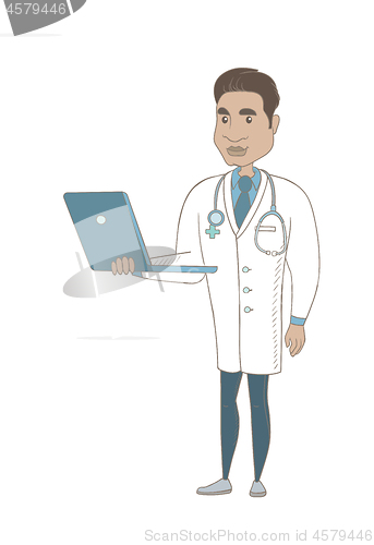 Image of Young hispanic doctor using a laptop.