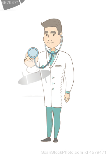 Image of Young caucasian doctor holding a stethoscope.