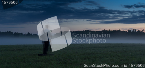 Image of Photographer in a fog field