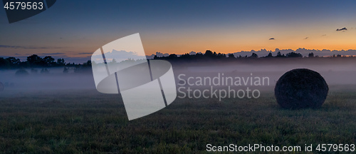 Image of Evening fog in european field