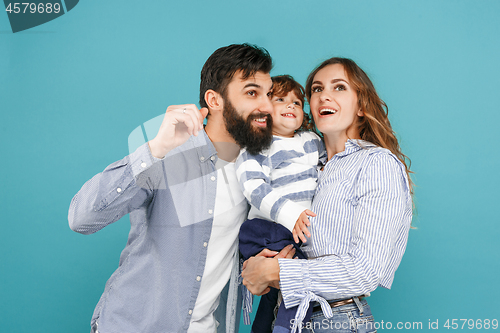 Image of A happy family on blue background