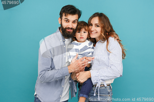 Image of A happy family on blue background