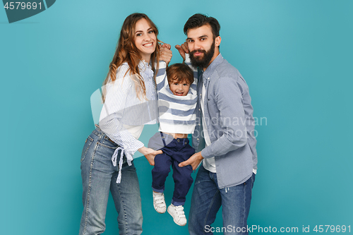 Image of A happy family on blue background