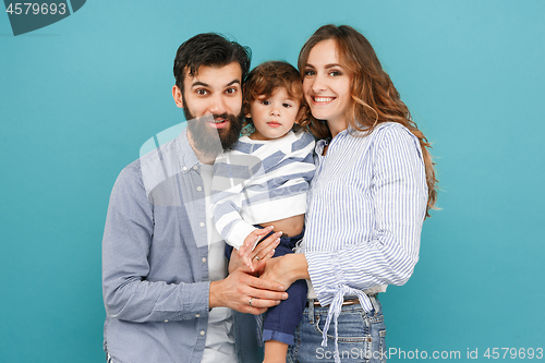 Image of A happy family on blue background