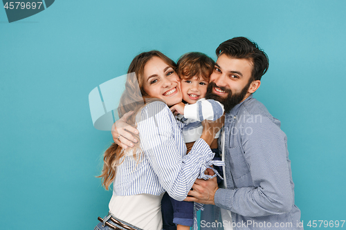 Image of A happy family on blue background