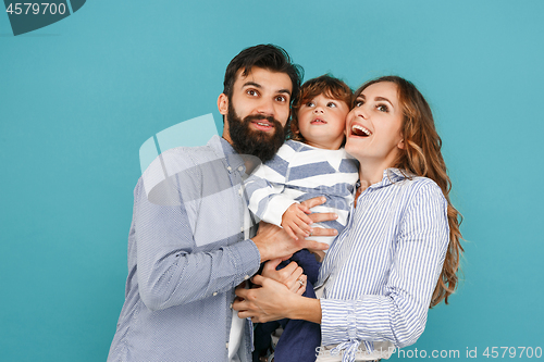 Image of A happy family on blue background