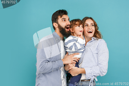 Image of A happy family on blue background
