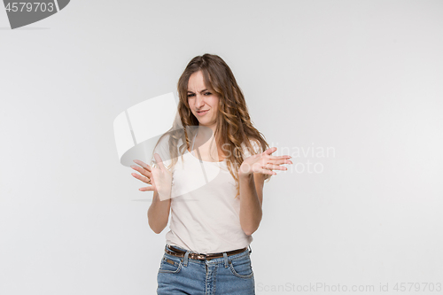 Image of Let me think. Doubtful pensive woman with thoughtful expression making choice