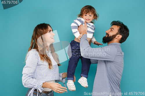 Image of A happy family on blue background