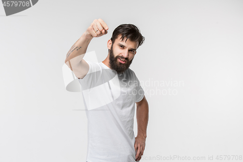 Image of The happy business man point you and want you, half length closeup portrait