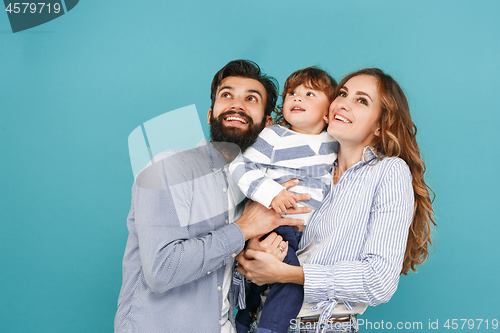 Image of A happy family on blue background