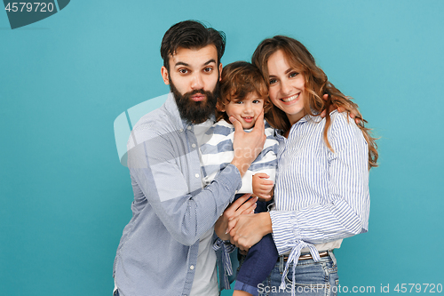 Image of A happy family on blue background