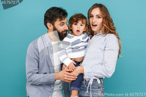 Image of A happy family on blue background