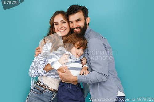 Image of A happy family on blue background