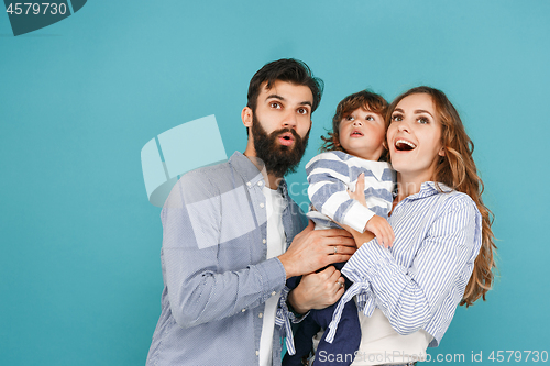 Image of A happy family on blue background