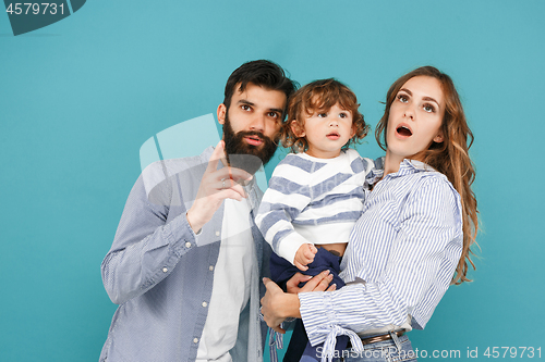 Image of A happy family on blue background