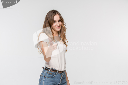 Image of The happy business woman point you and want you, half length closeup portrait on white background.