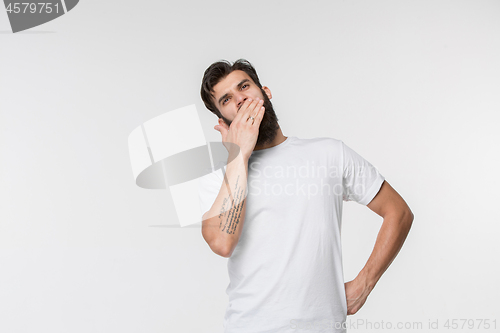 Image of Beautiful bored man bored isolated on white background