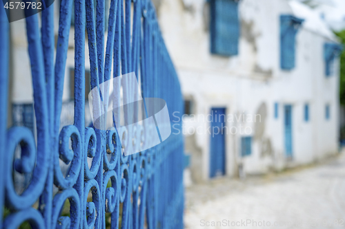 Image of Aged Blue doors and windows in Andalusian style from Sidi Bou Sa