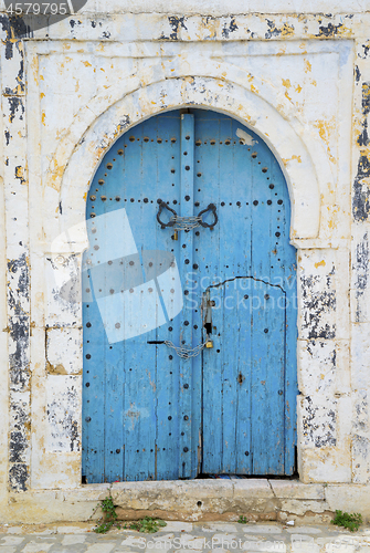 Image of Aged Blue door in Andalusian style from Sidi Bou Said