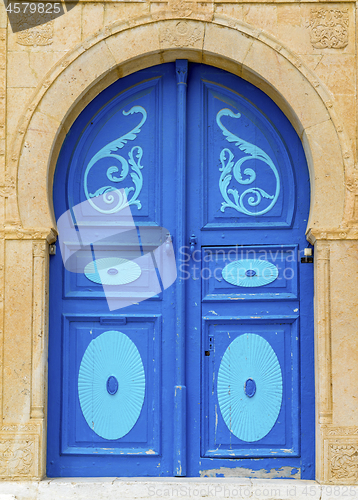 Image of Aged Blue door in Andalusian style from Sidi Bou Said