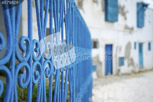 Image of Aged Blue doors and windows in Andalusian style from Sidi Bou Sa