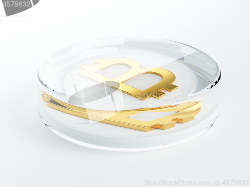 Image of bitcoin cryptocurrency golden symbol covered with glass 