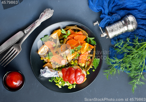 Image of vegetables with chicken leg