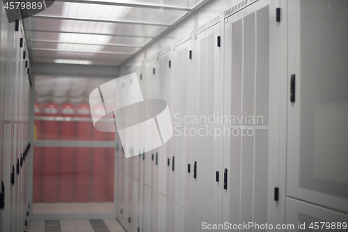 Image of modern server room with white servers