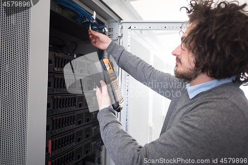 Image of technician using digital cable analyzer