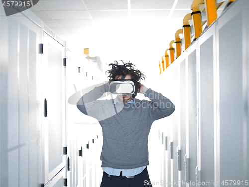 Image of IT engeneer using virtual reality headset