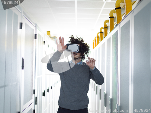 Image of IT engeneer using virtual reality headset