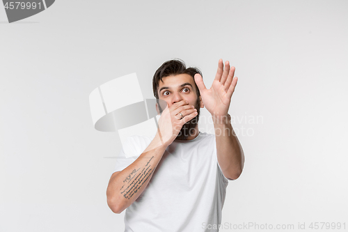 Image of Portrait of the scared man on white