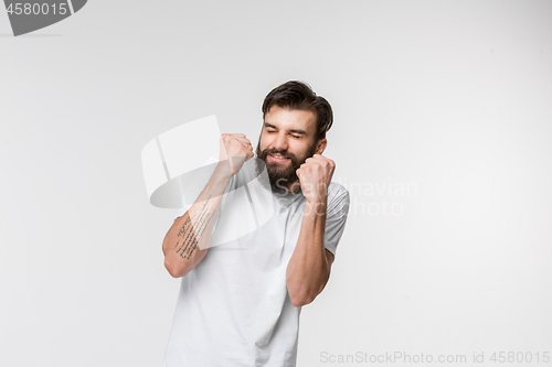 Image of Portrait of the scared man on white