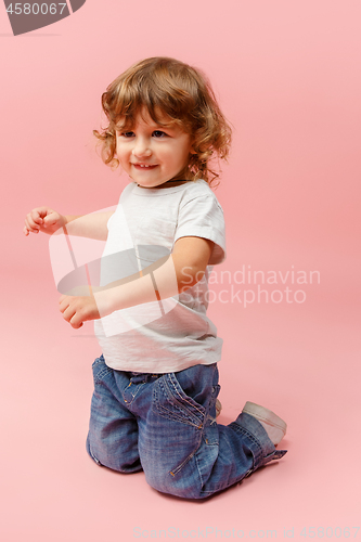 Image of Portrait of happy joyful beautiful little boy, studio shot