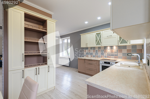 Image of Luxury modern provence styled grey, pink and cream kitchen interior