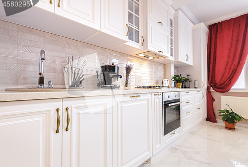 Image of Luxury modern white kitchen interior