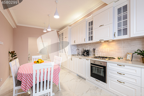 Image of Luxury modern white kitchen interior