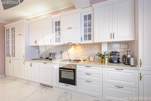 Image of Luxury modern white kitchen interior