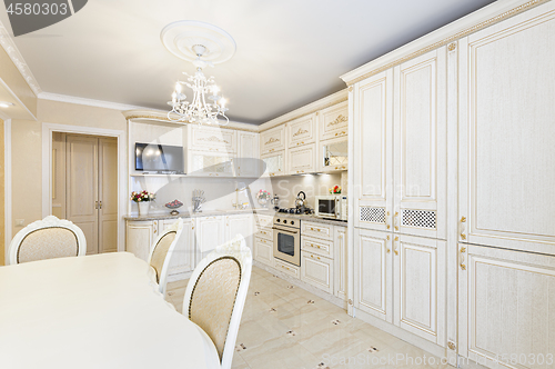 Image of Luxury modern beige and cream colored kitchen interior