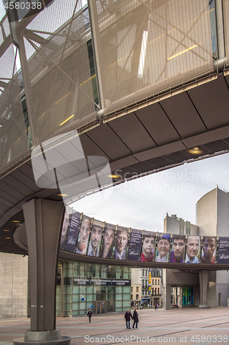 Image of Wide angle shot with people walking by European Parliament\'s Leopold Square