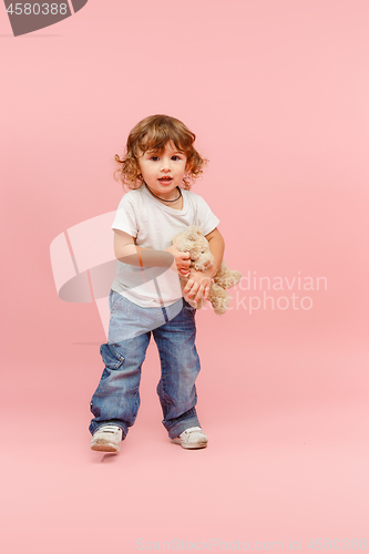 Image of Portrait of happy joyful beautiful little boy, studio shot