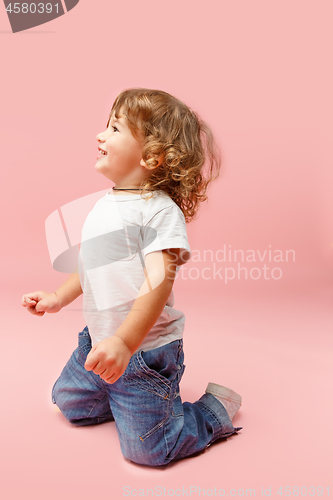 Image of Portrait of happy joyful beautiful little boy, studio shot