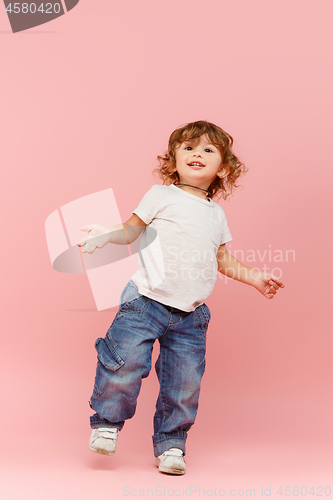 Image of Portrait of happy joyful beautiful little boy, studio shot