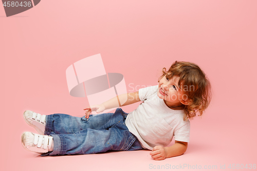 Image of Portrait of happy joyful beautiful little boy, studio shot