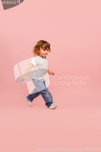 Image of Portrait of happy joyful beautiful little boy, studio shot